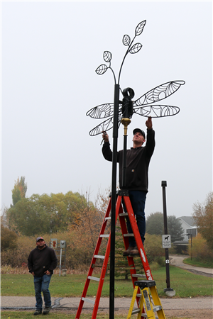 Public Works Adjusts the Sculpture